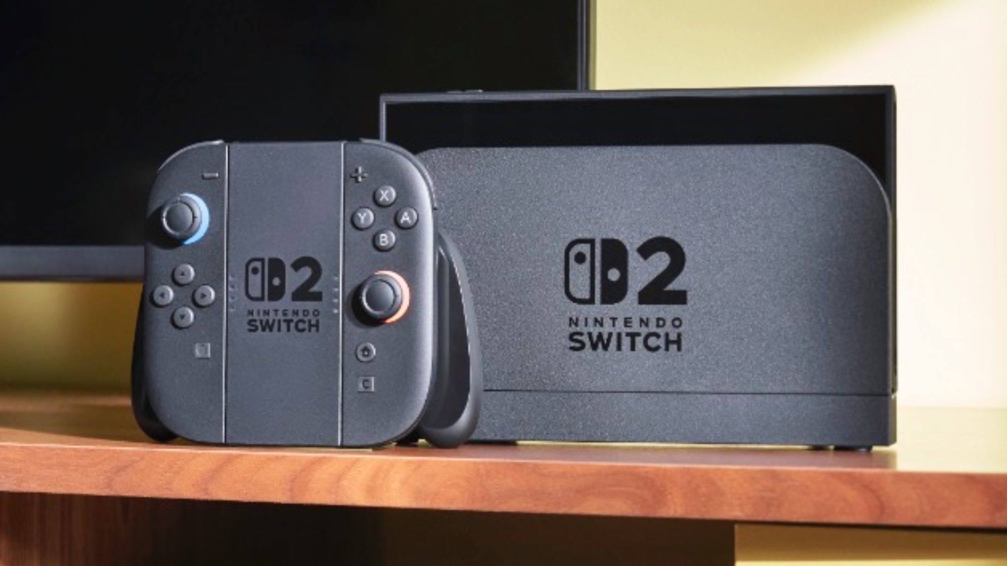 קונסולת Nintendo Switch 2 על השולחן מול טלוויזיה