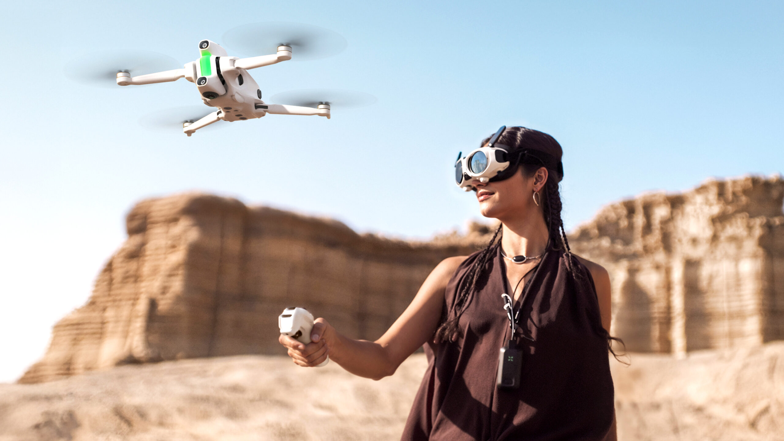 An Antigravity A1 drone being flown by a woman