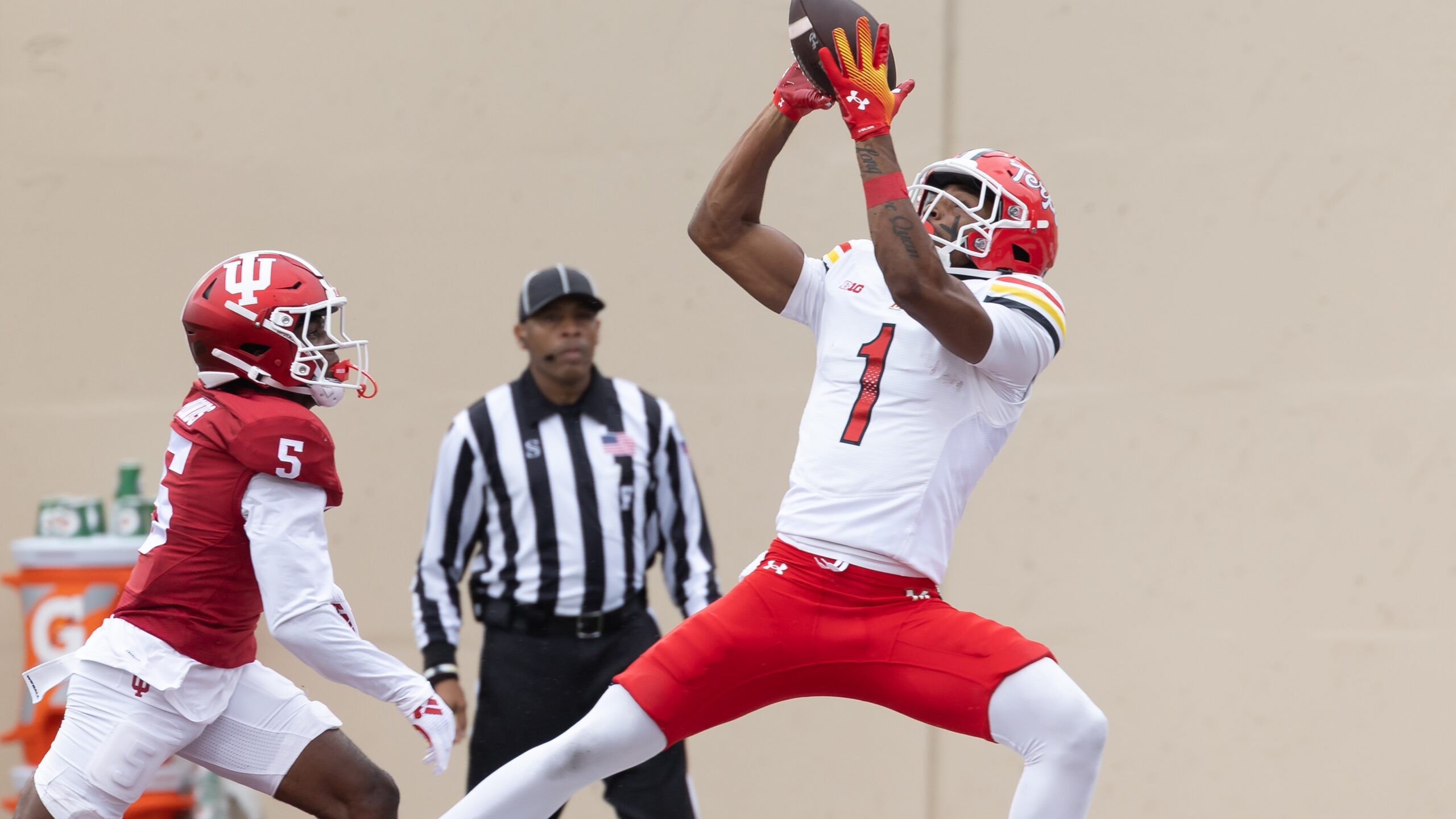 Kaden Prather #1 of the Maryland Terrapins catches a pass for a touchdown during the first half against D'Angelo Ponds #5 of the Indiana Hoosiers at Memorial Stadium on September 28, 2024 in Bloomington, Indiana.