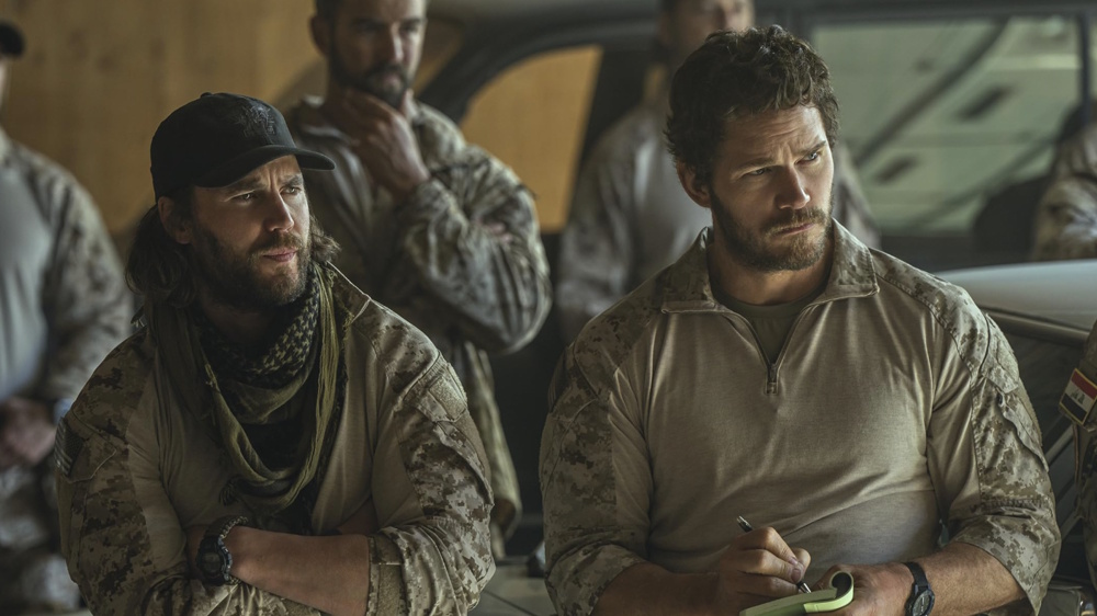 Taylor Kitsch as Ben Edwards and Chris Pratt as James Reece recieving a mission briefing in an episode of The Terminal List: Dark Wolf