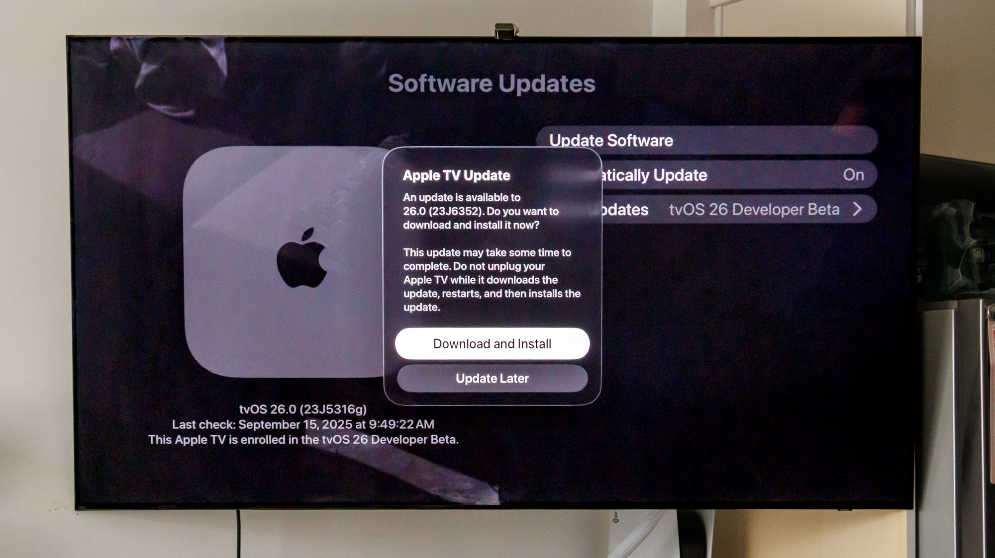Apple TVOS 26 מסך הורדה