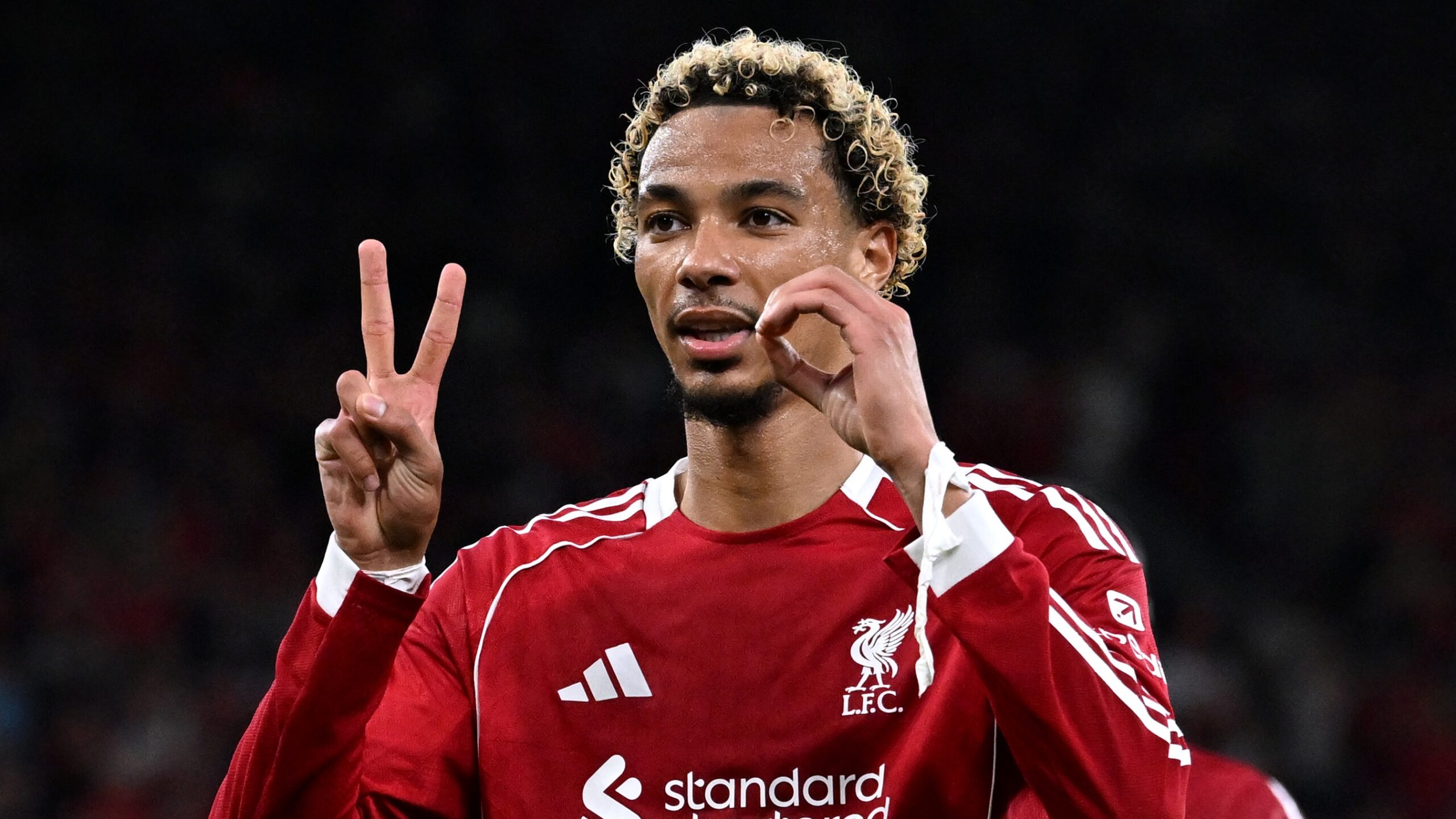 Hugo Ekitike of Liverpool celebrates scoring his team's first goal during the Premier League match between Liverpool and Bournemouth at Anfield on August 15, 2025 in Liverpool, England.