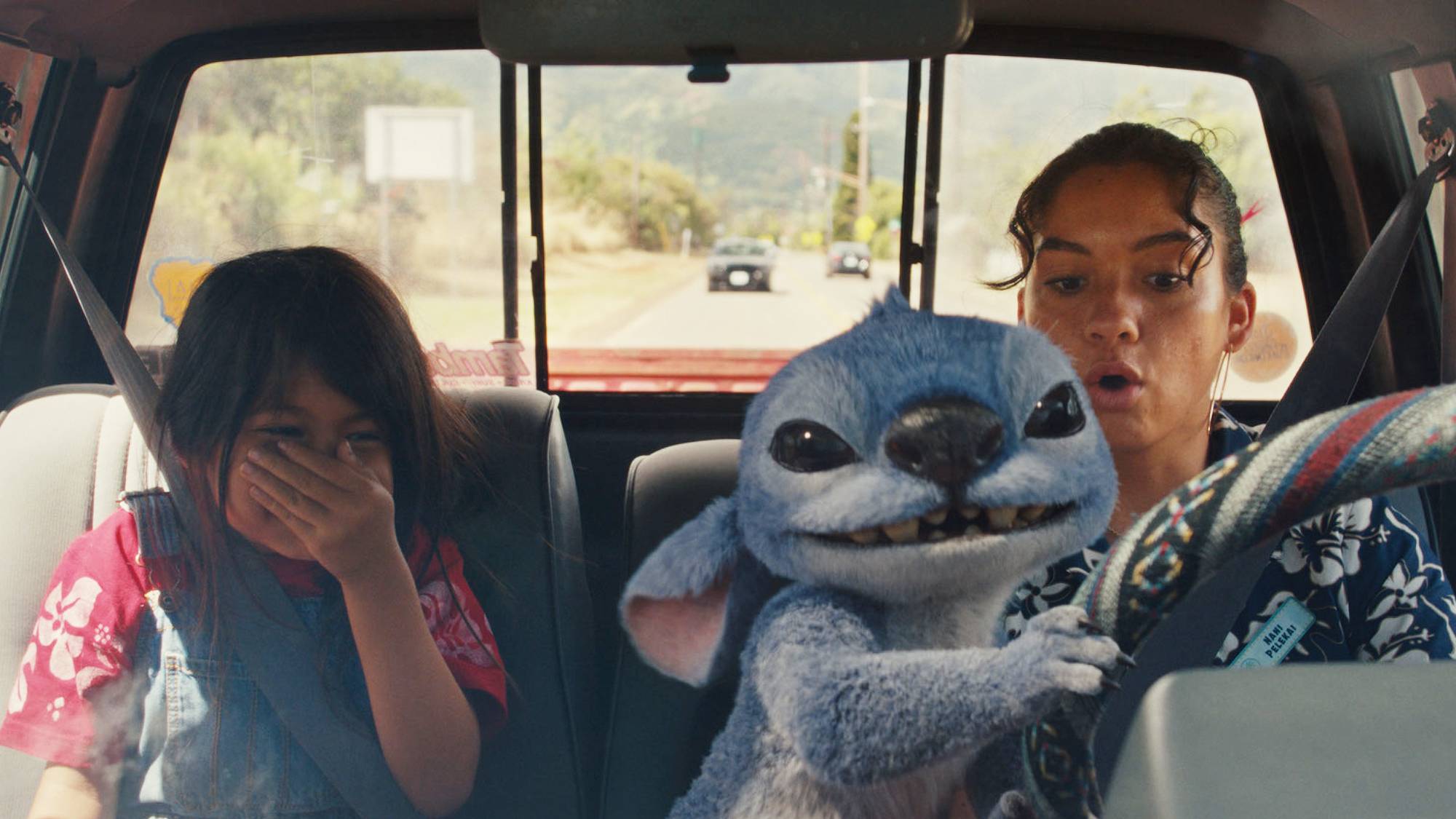 Maia Kealoha as Lilo, Stitch and Sydney Agudong as Nani in Disney’s live-action "Lilo &amp; Stitch" movie (2025)