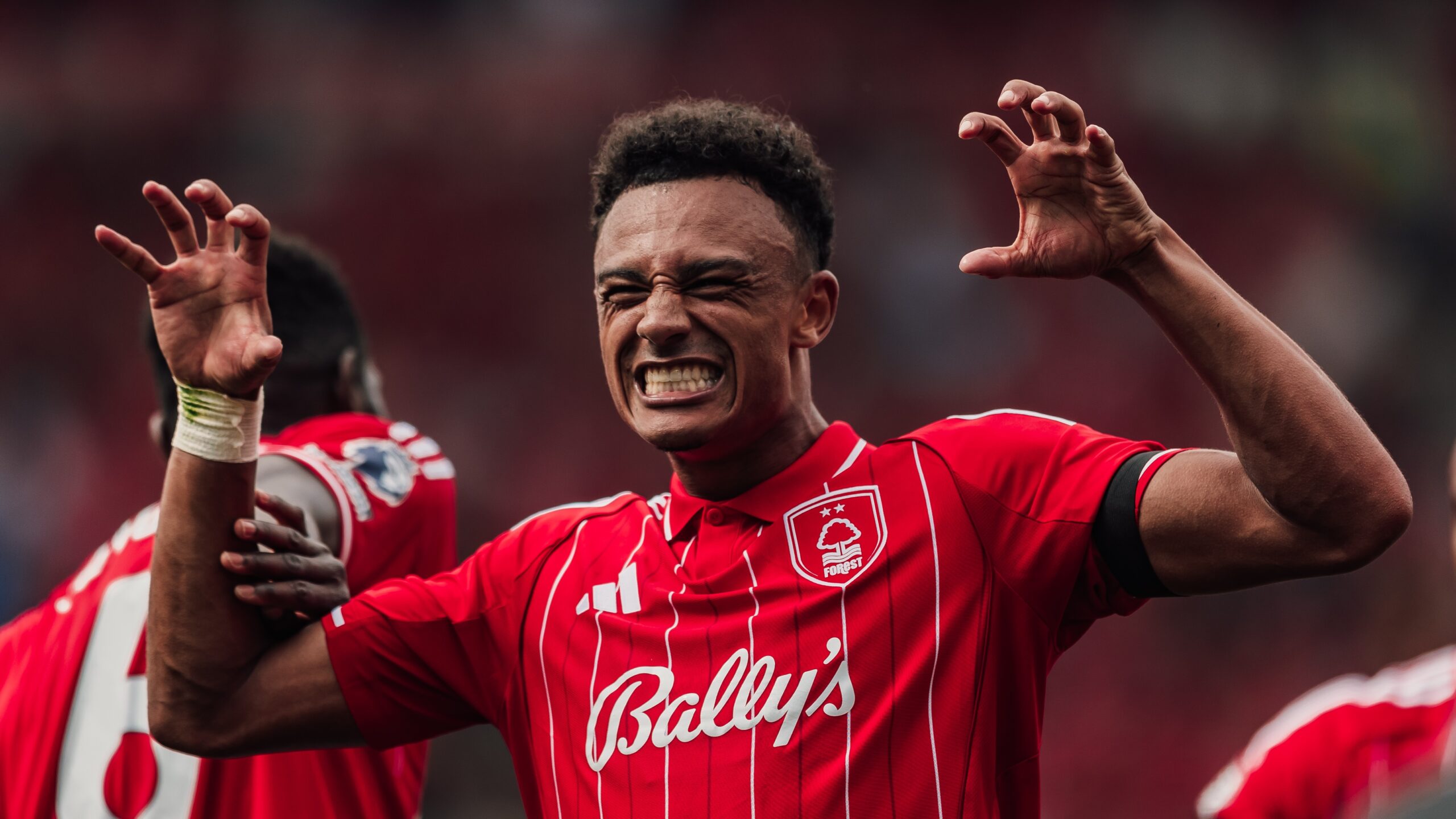 Dan N'Doye of Nottingham Forest celebrates his opening day goal with team mates during the Premier League match between Nottingham Forest and Brentford at City Ground on August 17, 2025 in Nottingham, United Kingdom.