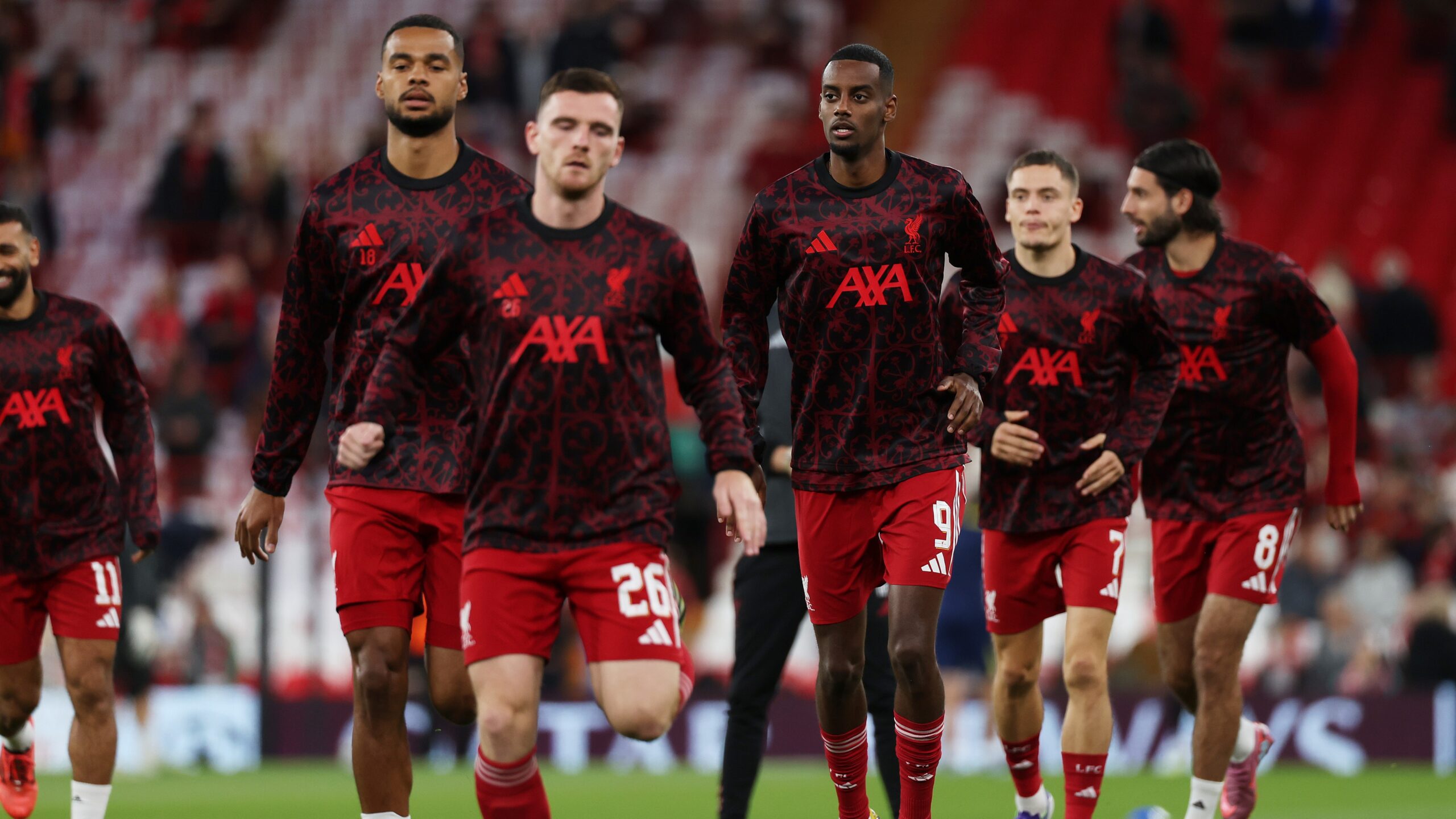 Liverpool players warming up before their UCL clash with Atletico Madrid.