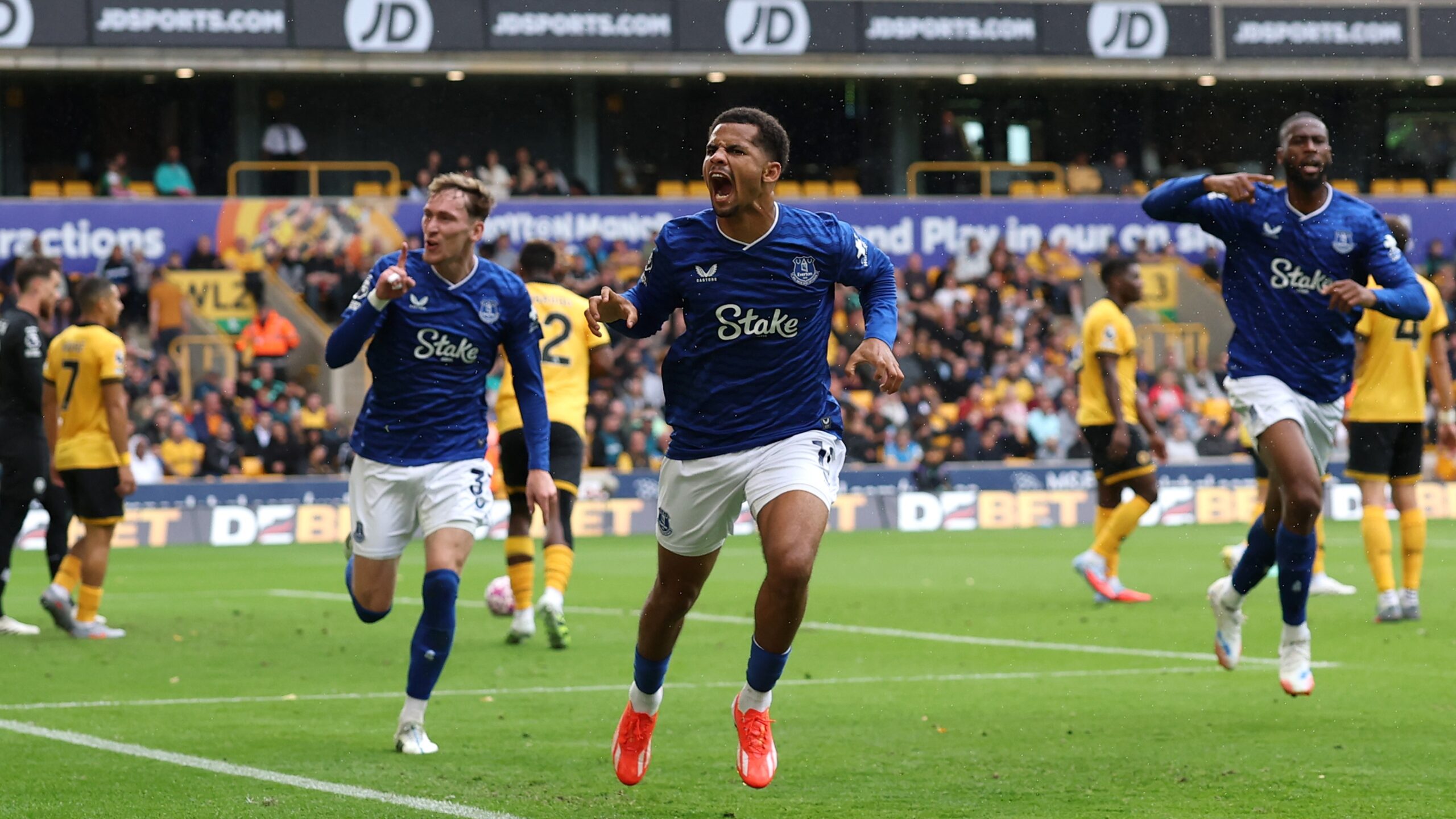 Iliman Ndiaye celebrates scoring Everton's second goal vs Wolves as he taunts the away fans.
