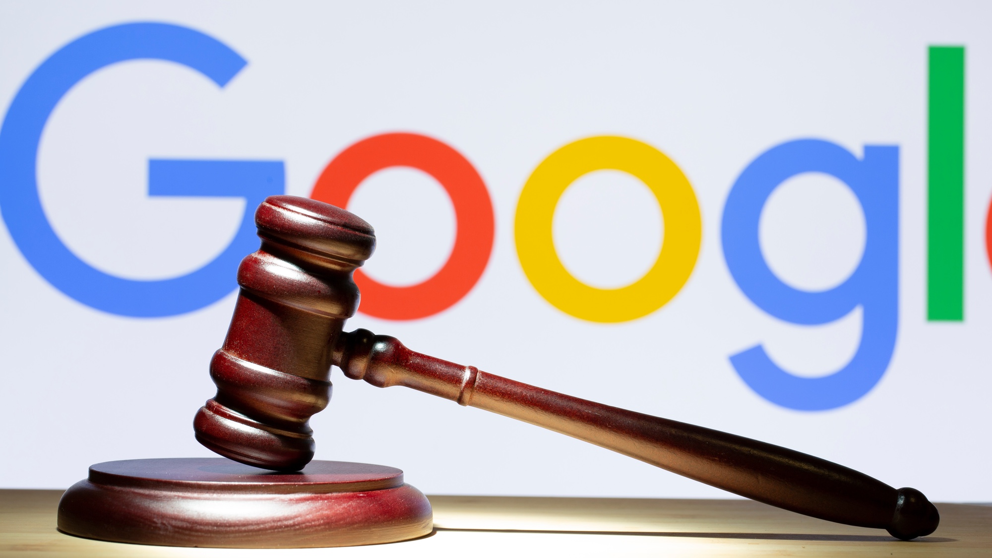 google logo with a gavel