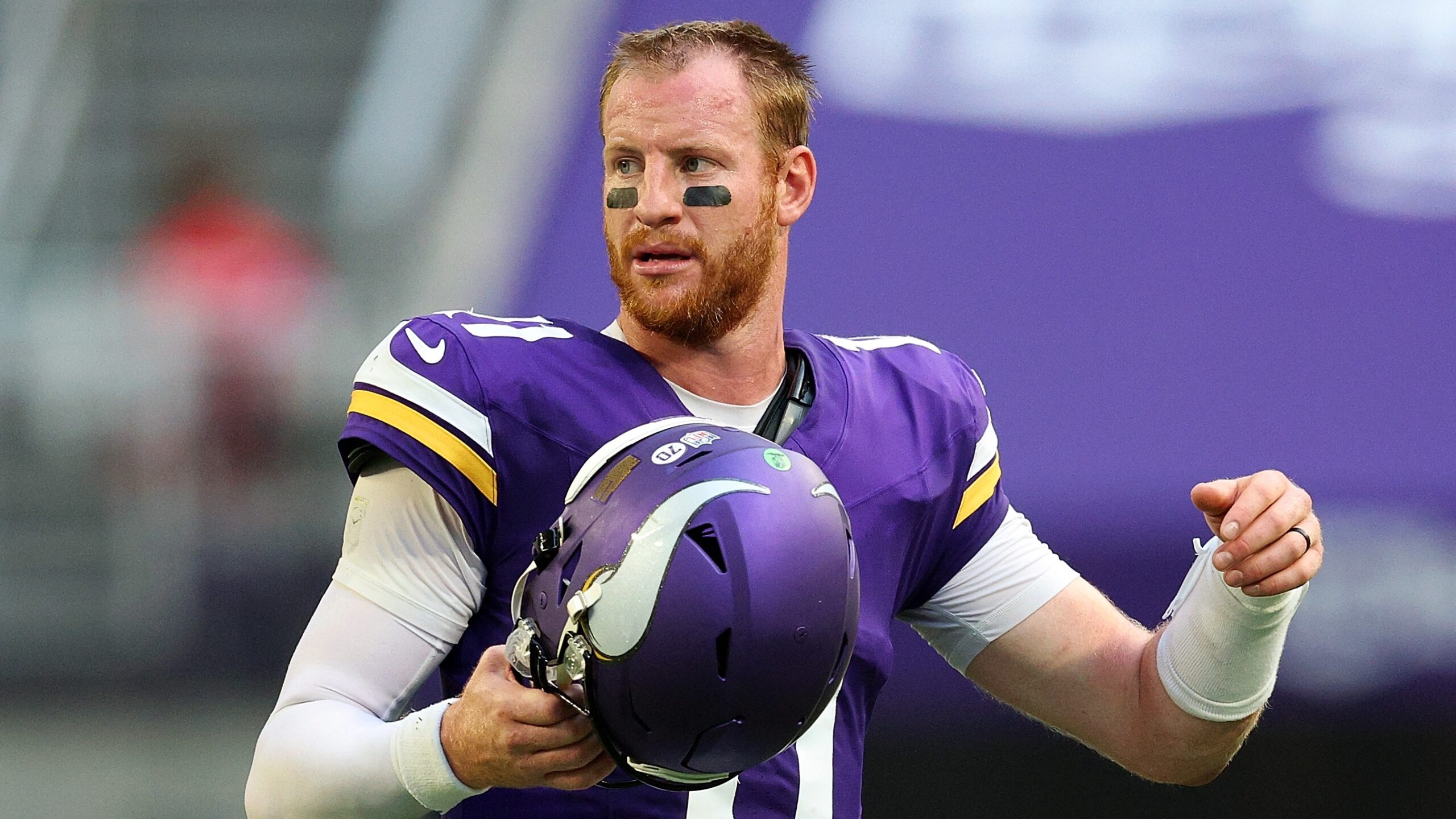 Carson Wentz #11 of the Minnesota Vikings looks on against the Cincinnati Bengals in the third quarter at U.S. Bank Stadium on September 21, 2025 in Minneapolis, Minnesota.