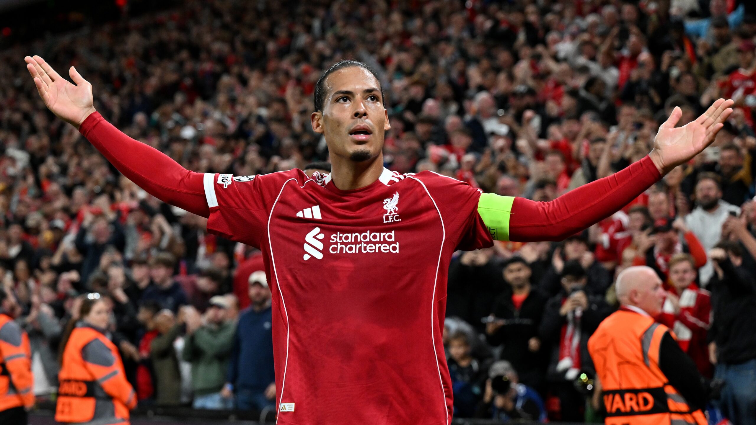 Virgil van Dijk of Liverpool celebrates scoring his team's third goal during the UEFA Champions League 2025/26 League Phase MD1 match between Liverpool FC and Atletico de Madrid at Anfield on September 17, 2025 in Liverpool, England.