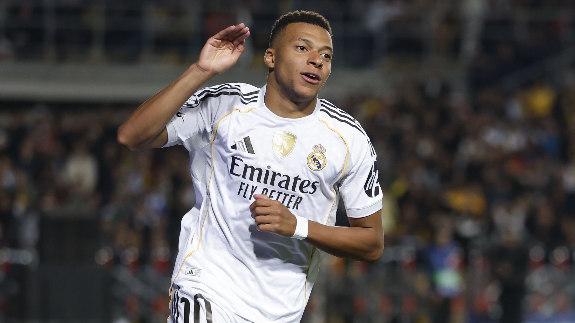 Kylian Mbappé celebrating after scoring for Real Madrid during the UEFA Champions League 2025/26 League Phase.