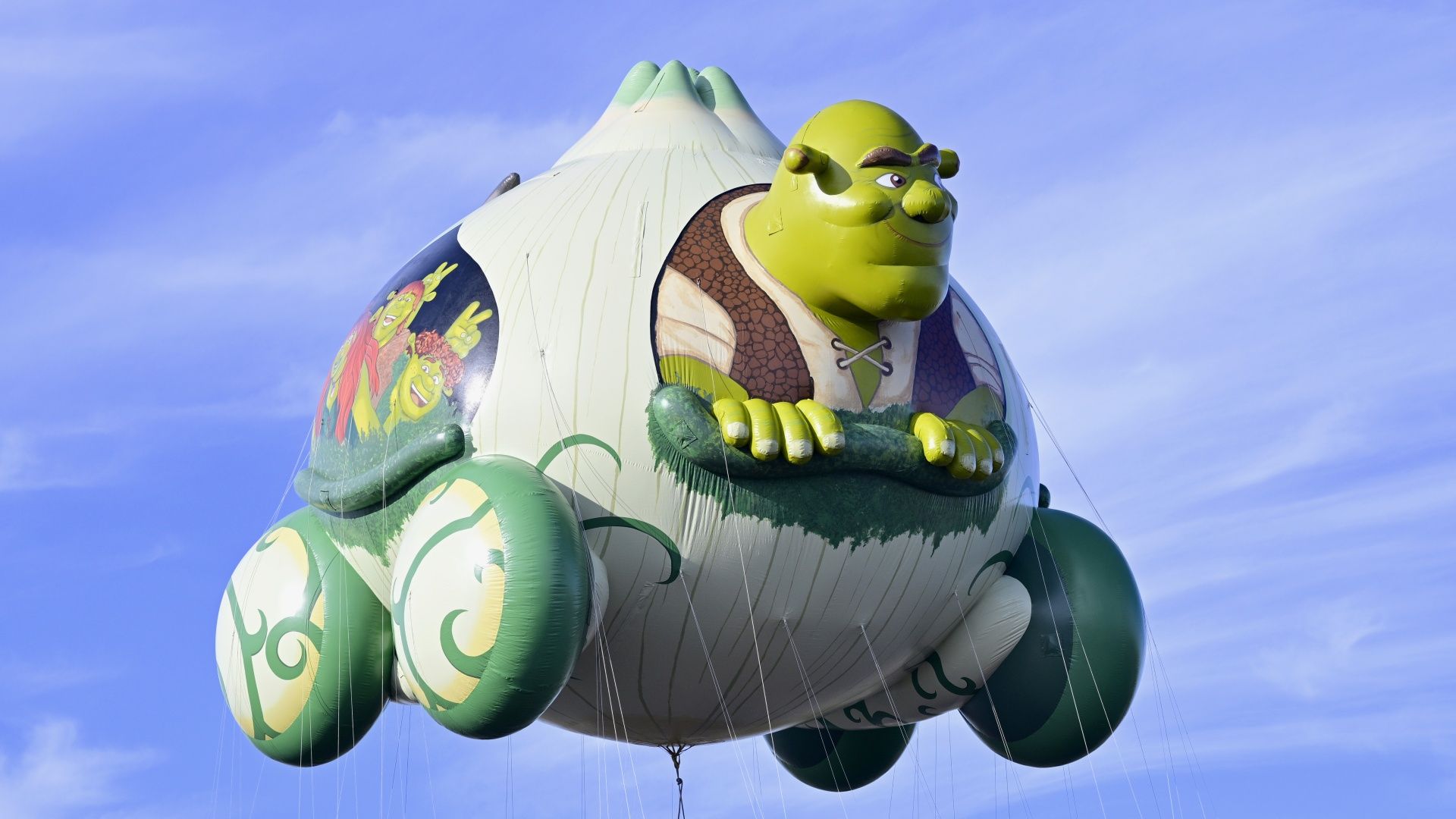The Shrek’s Onion Carriage balloon taking a test flight in preparation for Macy's Thanksgiving Day Parade 2025