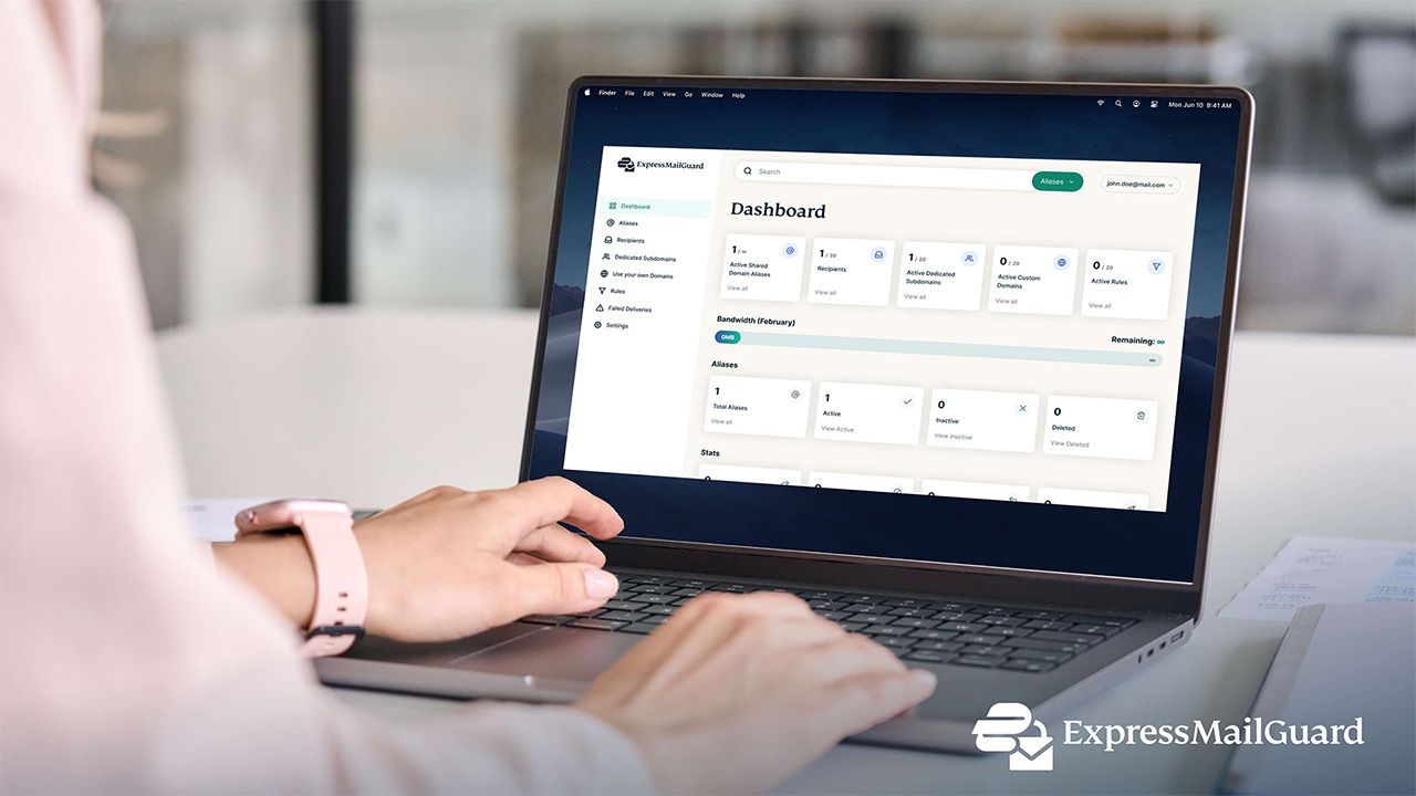 Person navigating the ExpressMailGuard dashboard on a laptop