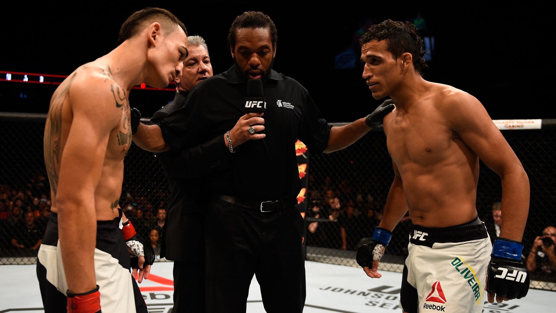 Max Holloway and Charles Oliveira facing off in 2015