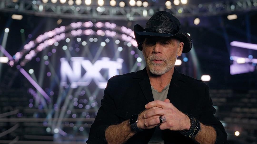 Shawn Michaels wearing a black cowboy hat sits for an interview in The Heartbreak Kid Becoming Shawn Michaels wrestling documentary streaming now on Peacock
