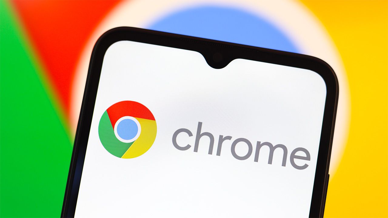 Google Chrome logo displayed on smartphone screen, with larger logo behind