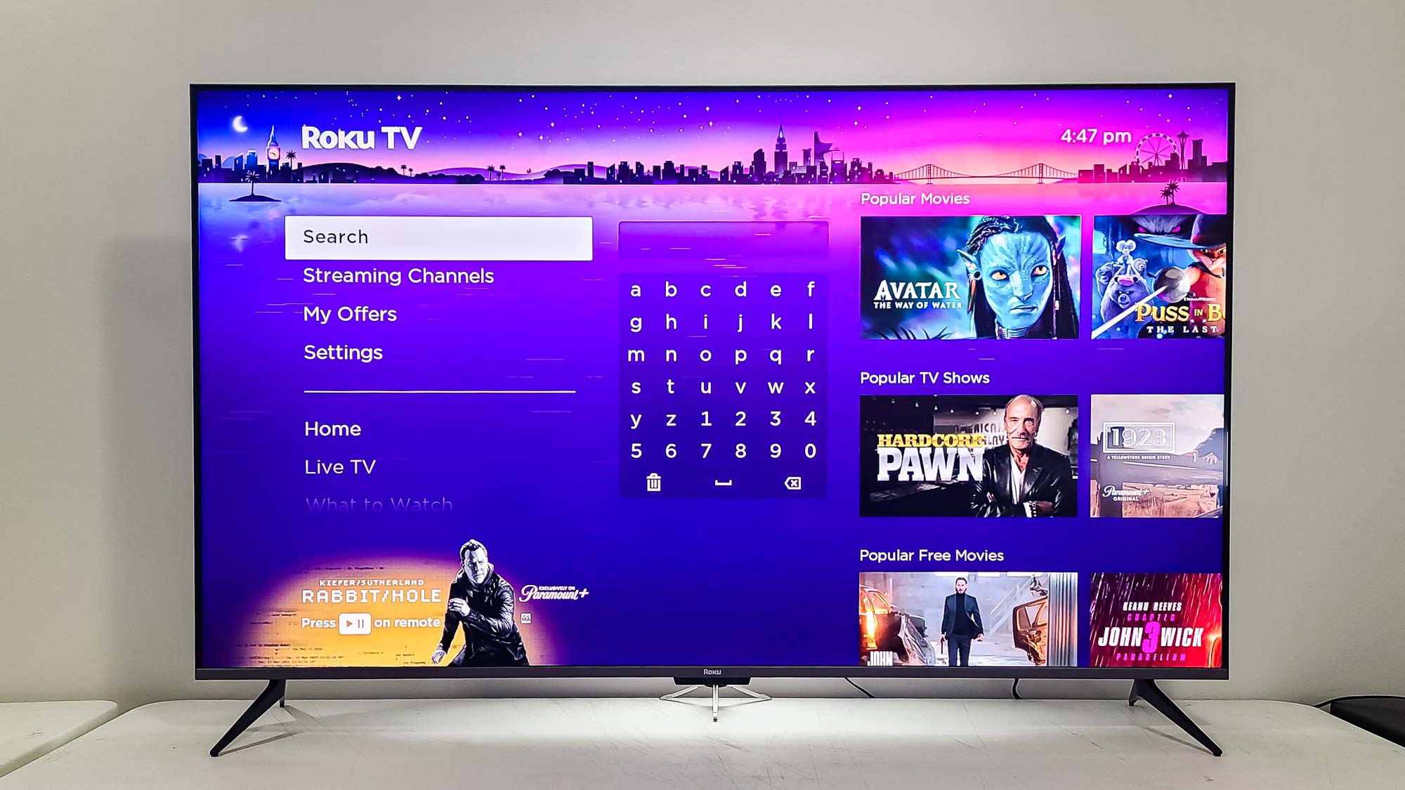 תפריט טלוויזיה מסדרת Roku Plus 4K QLED