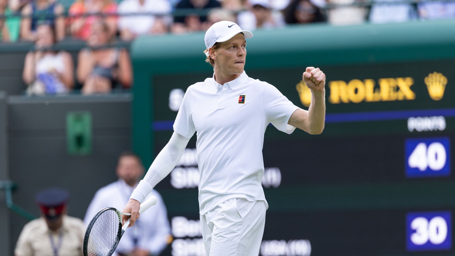 Jannik Sinner of Italy celebrates winning a point during a men's singles match at the All England Lawn and Tennis Club at Wimbledon in London, England.