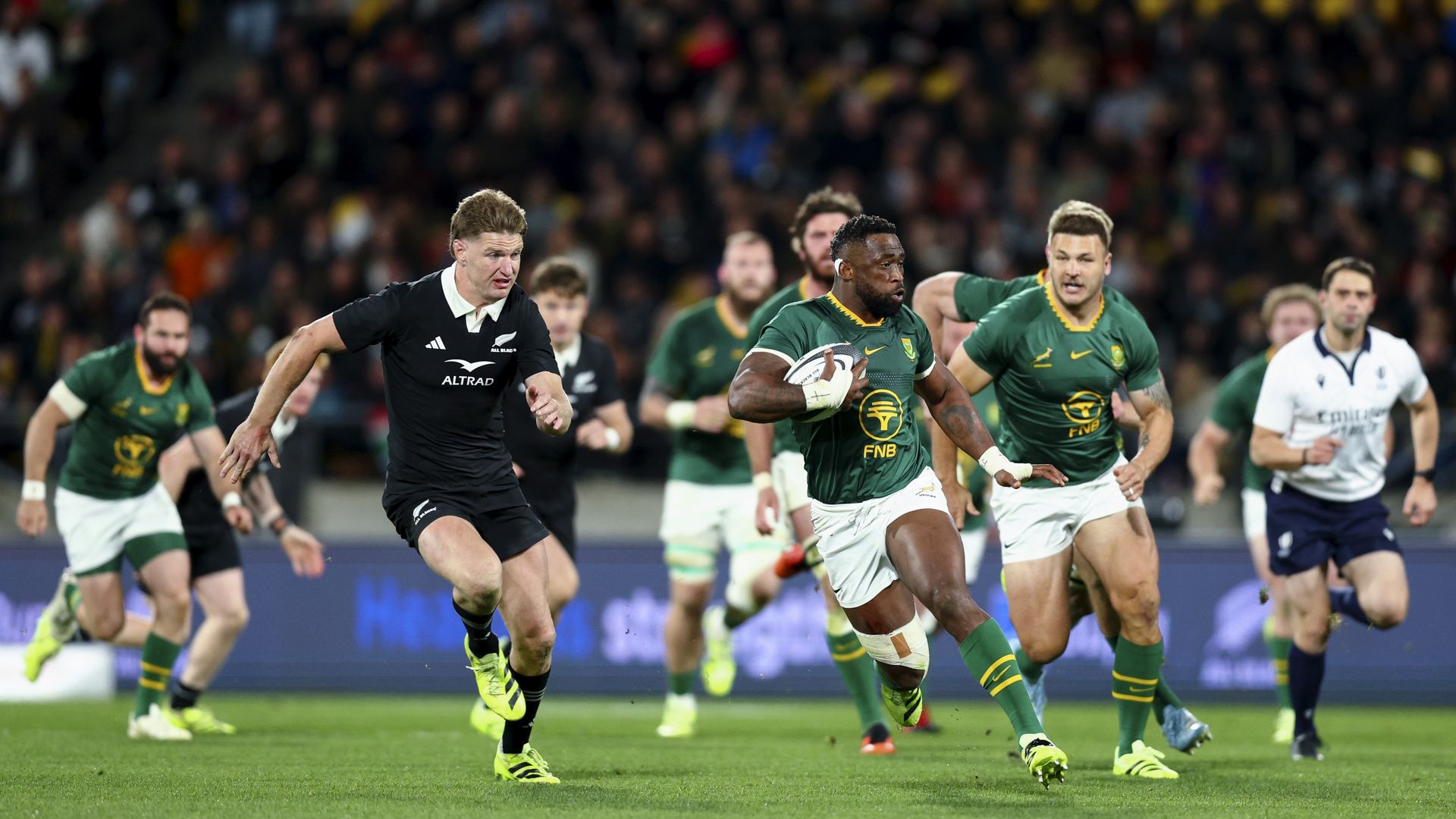 Siya Kolisi of South Africa makes a break during a rugby match against the New Zealand All Blacks.
