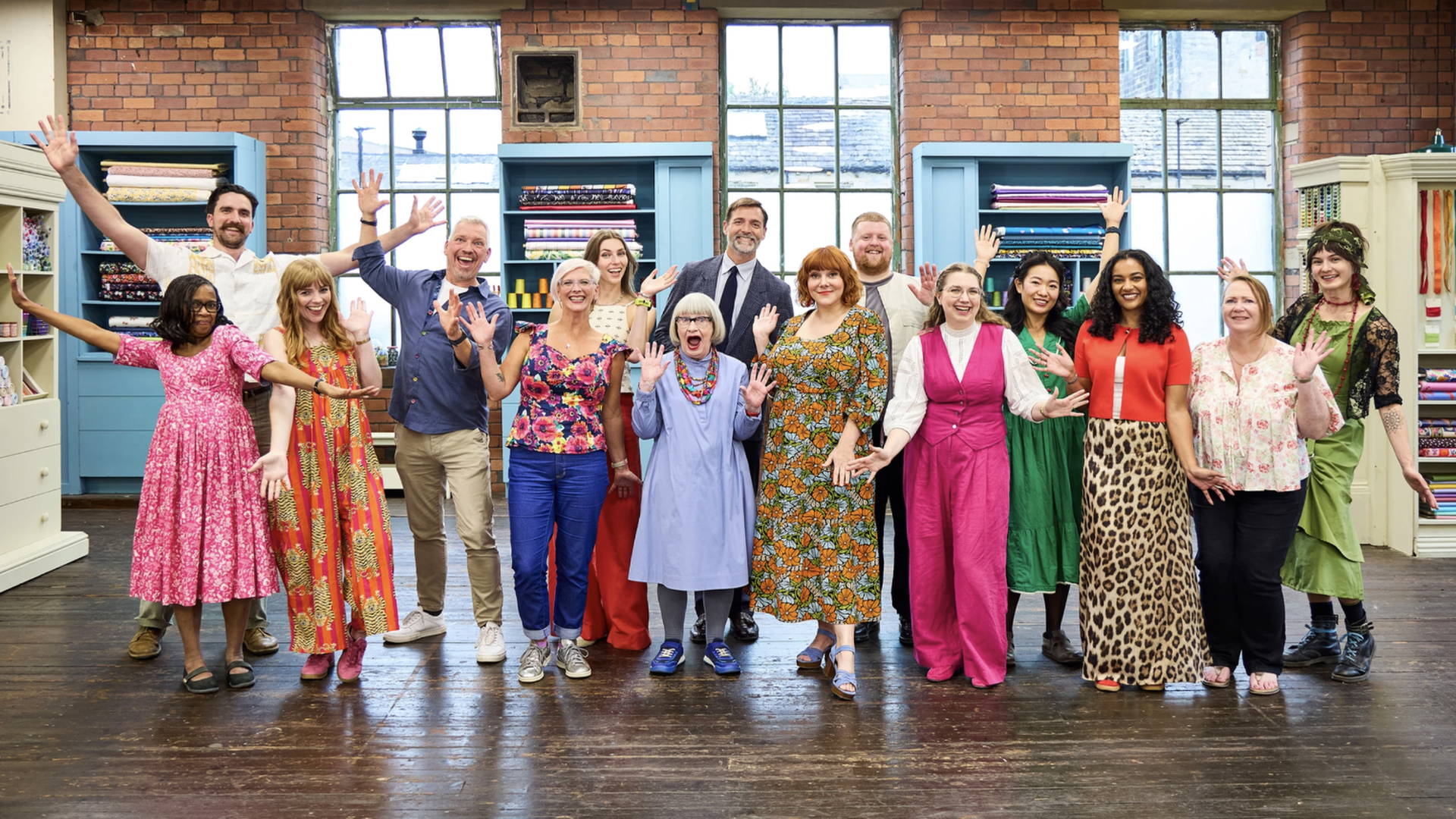 Esme Young, Patrick Grant and Sophie Willan flanked by The Great British Sewing Bee 2026 contestants