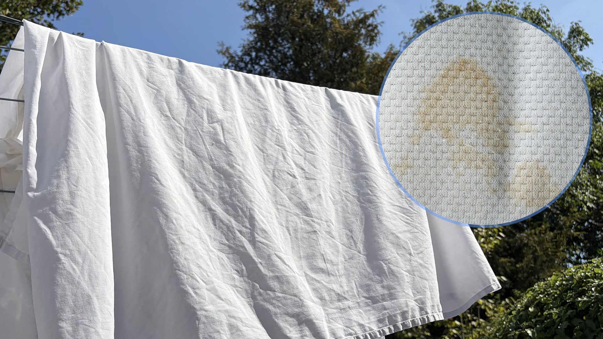 The main image shows a white duvet cover on a washing line on a sunny day. In the top right corner is an ident showing a close up of a yellow stain on bedding