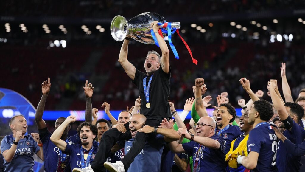 Luis Enrique head coach of PSG lifts the Champions League trophy following the UEFA Champions League Final 2026 match between Paris Saint-Germain and Arsenal FC at Puskas Arena.