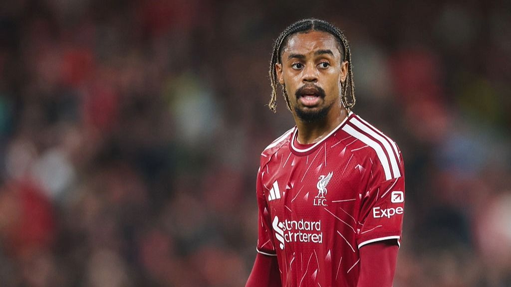 Bradley Barcola, wearing the red of Liverpool, looks on during a Premier League 2026/27 game.