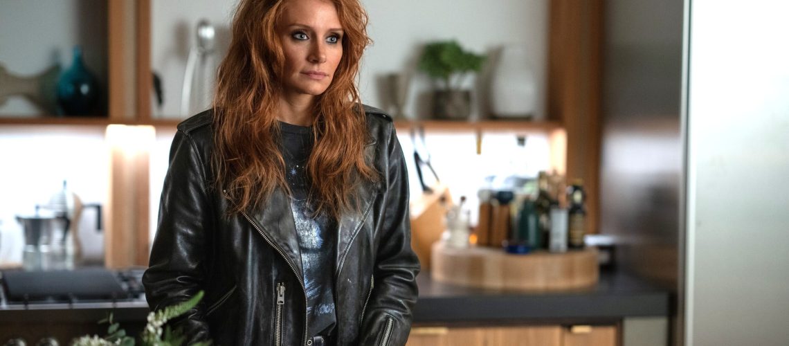Kat (Bryce Dallas Howard) stands in a kitchen in a scene from Prime Video's "Deep Cover"