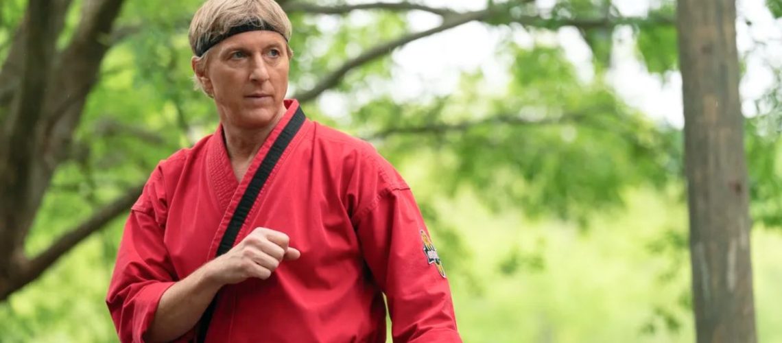 William Zabka in red kung fu attire in