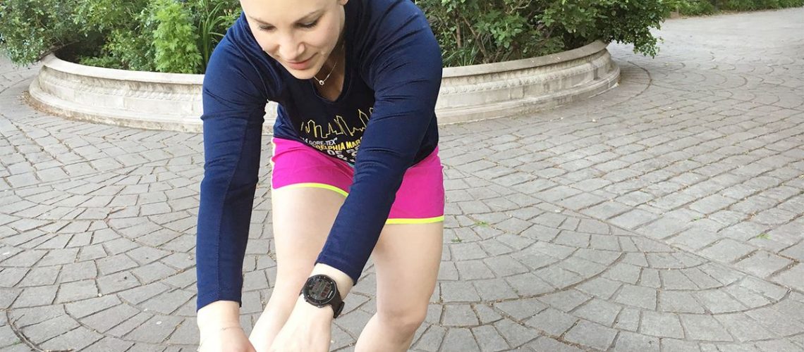 A women stretching before a run.