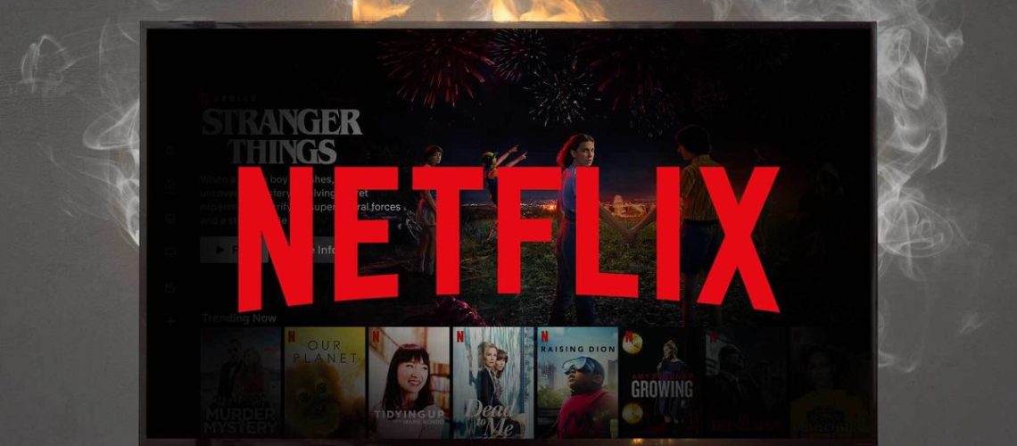 A TV with the netflix logo and show art is on fire