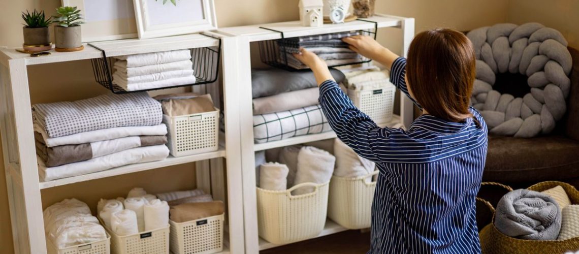 A woman organizing shelves