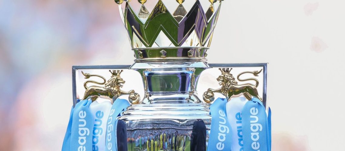 The Premier League trophy with light blue and white streamers