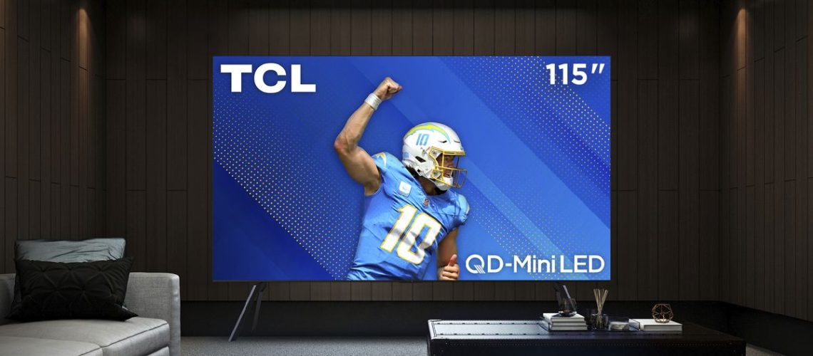 TCL Qm89 on stand in living room