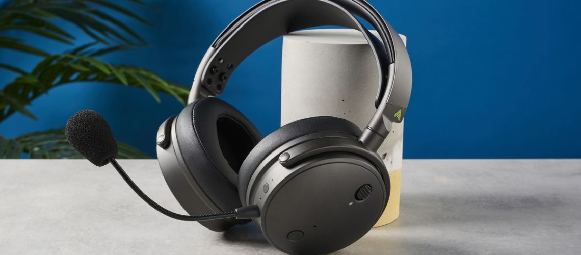 A photograph of the Audeze Maxwell outer earcups showing the mic controls