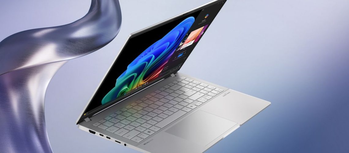 Asus Vivobook S 15 laptop with water tendrals around it.