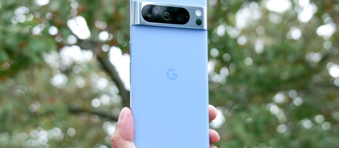 Google Pixel 8 Pro held in hand.