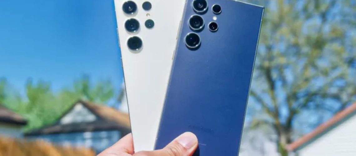 Samsung Galaxy S24 Ultra and Galaxy S23 Ultra in hand showing cameras