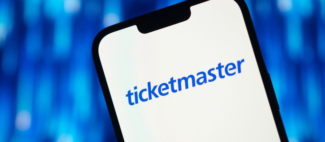 Ticketmaster app open on a smartphone with a blue background