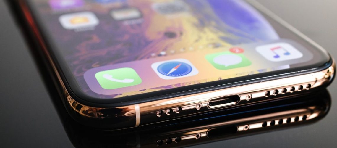 The lower half of an iPhone showing the speakers ready to demonstrate how to clean iPhone speakers