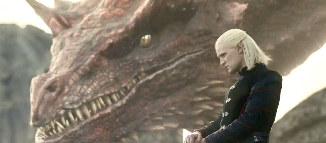 Prince Daemon (Matt Smith) stands next to Caraxes in