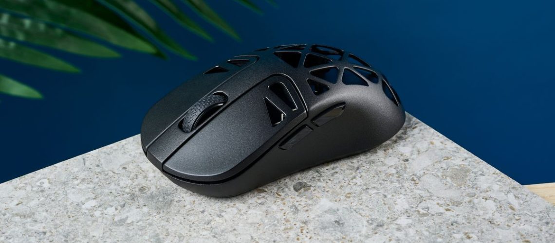 A black Keychron M3 Mini 4K Metal wireless gaming mouse