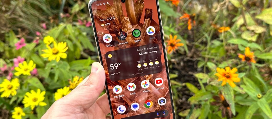 Google Pixel 8 shown held in hand