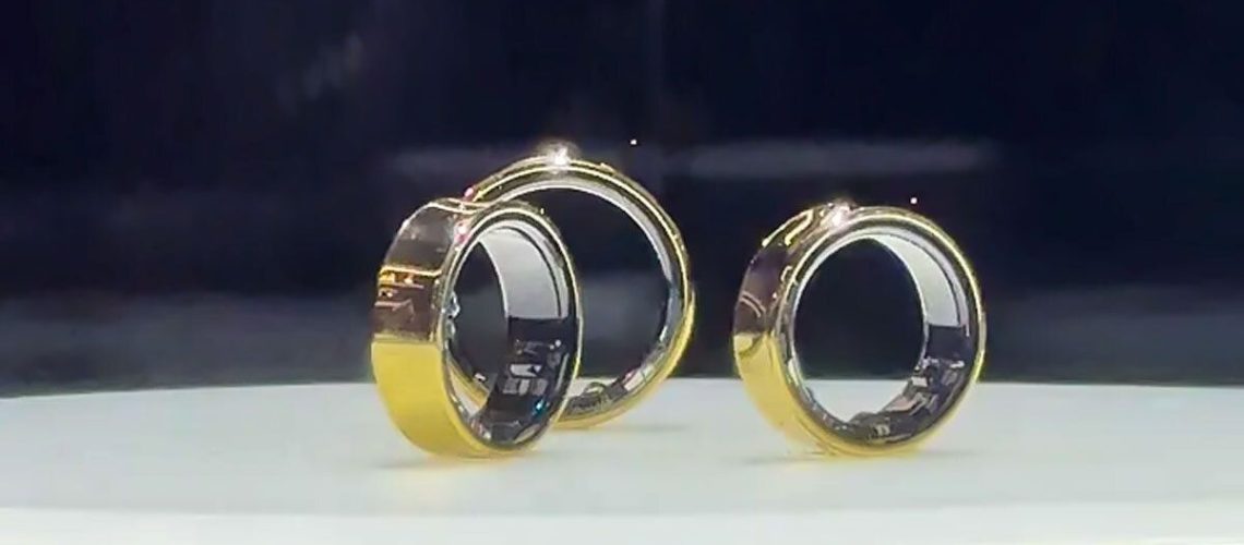 The Samsung Galaxy Ring in silver against an outer space background with stars