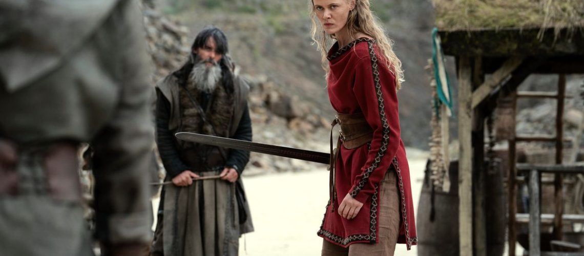 Freydis (Frida Gustavsson) holding a sword in