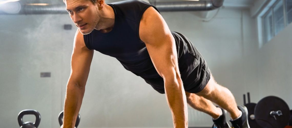 man performing a push up