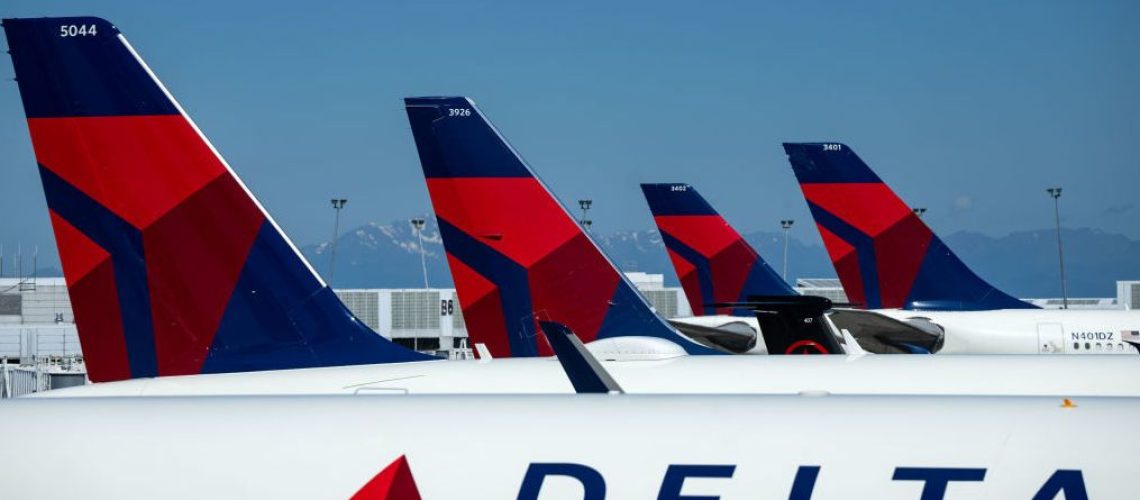 Rows of Delta planes at an airport