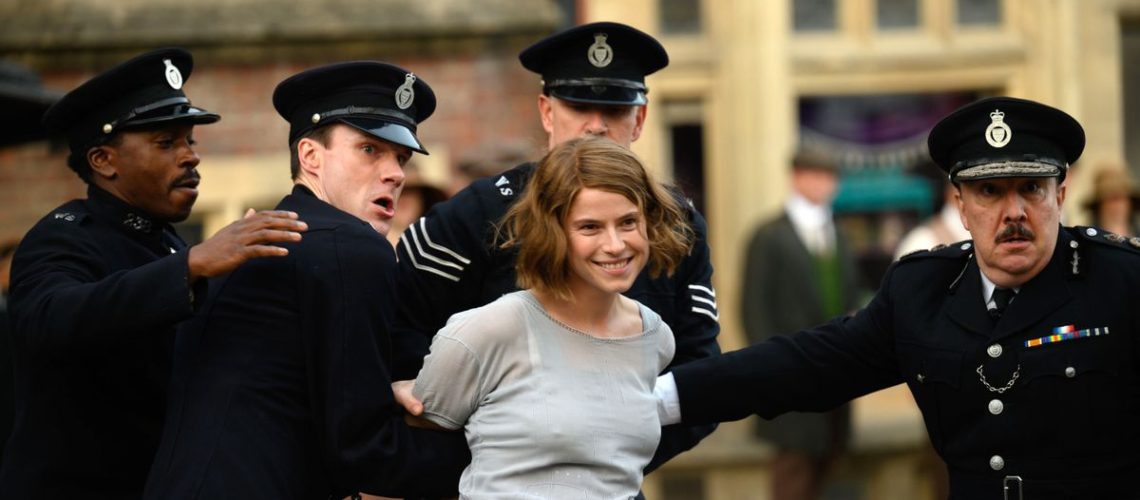 Rose Gooding (Jessie Buckley) being arrested by police officers in