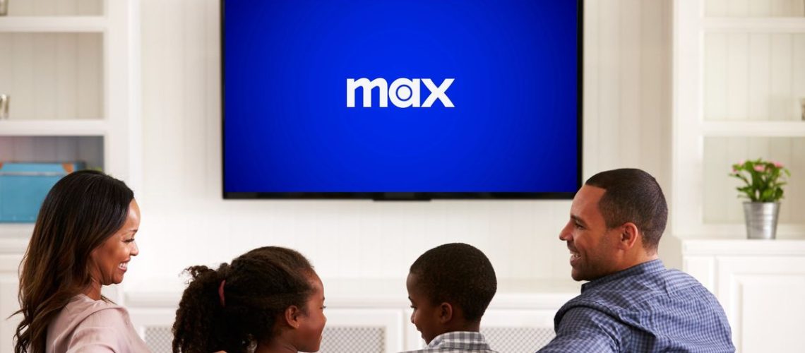 Max logo on a television screen in front of a family