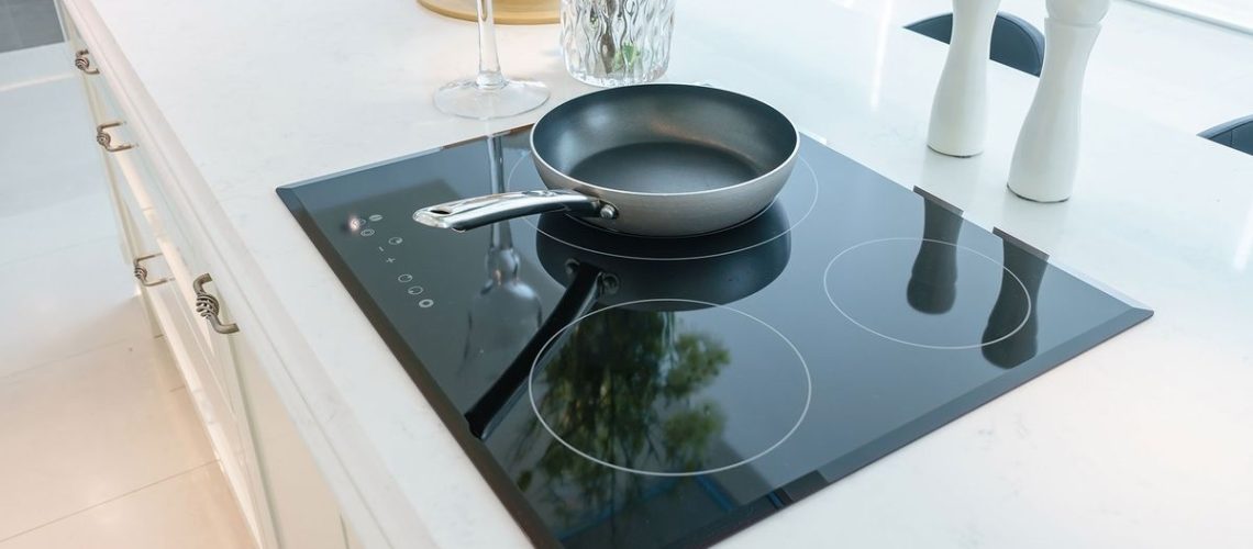 Frying pan on glass stovetop