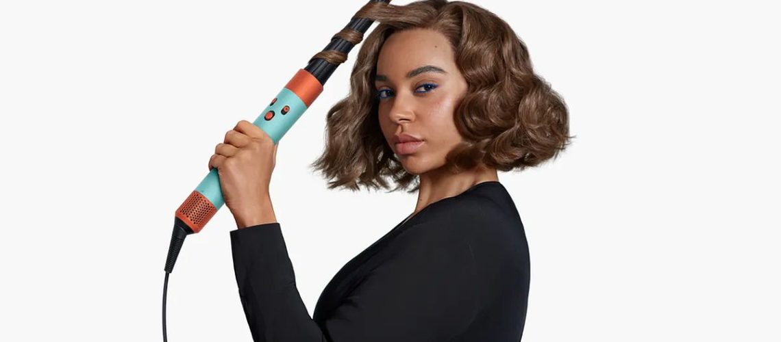 A model using the Dyson Airwrap styler